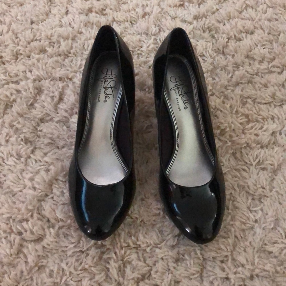 Never worn small black heel